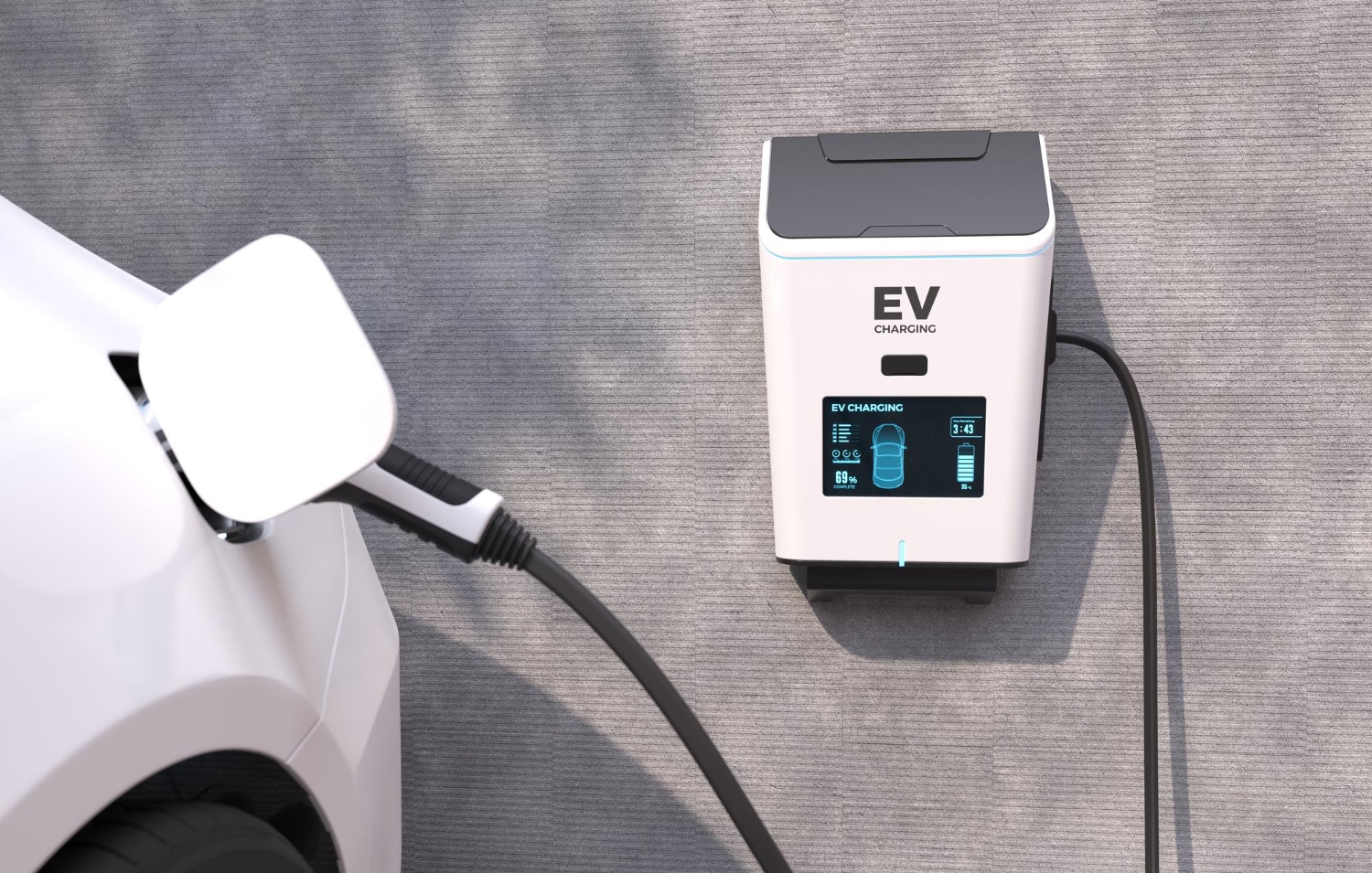 Electric car connected to a wall-mounted EV charging station.