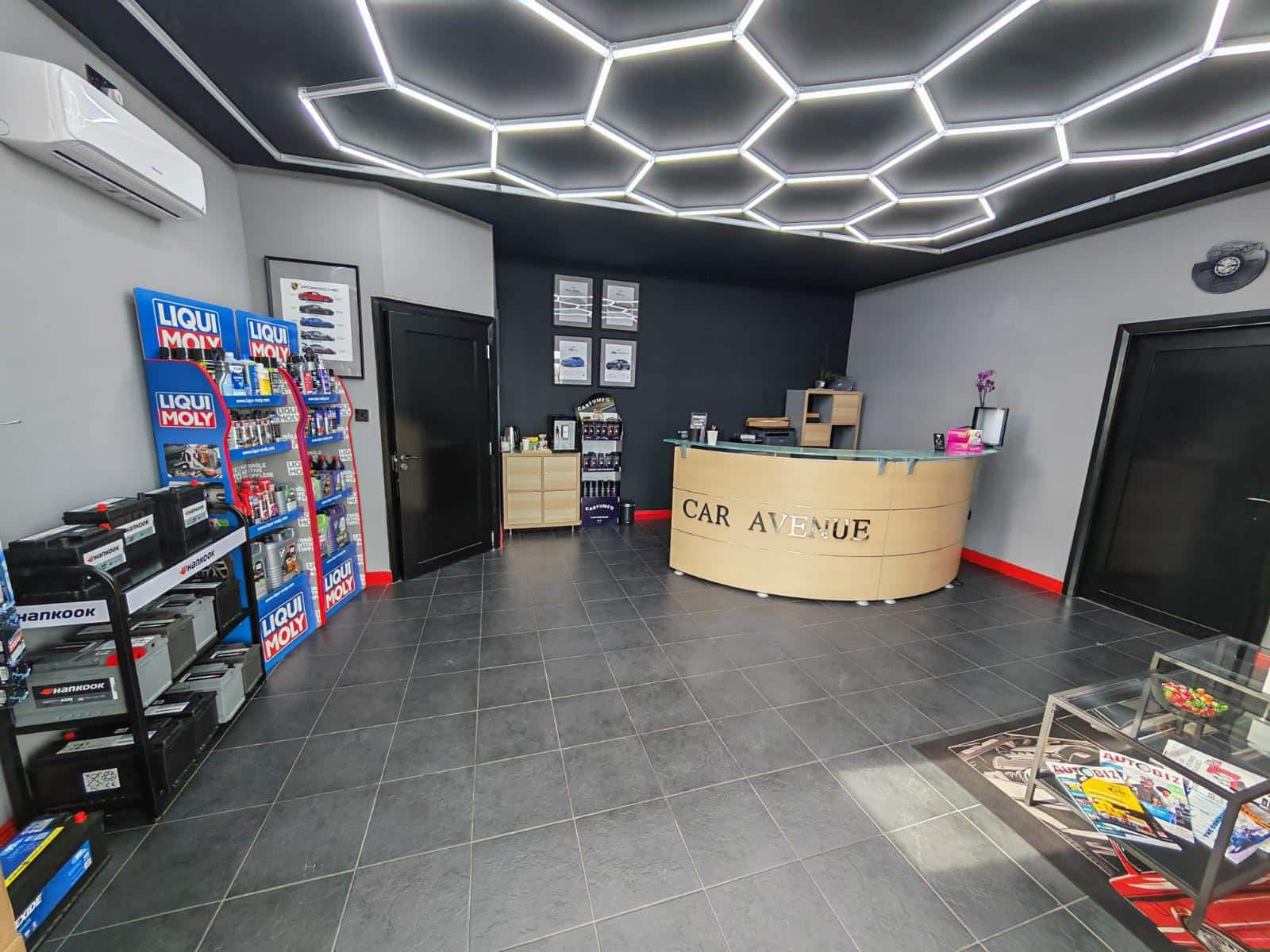 Car Avenue modern EV and hybrid vehicle repair workshop reception area in Ireland
